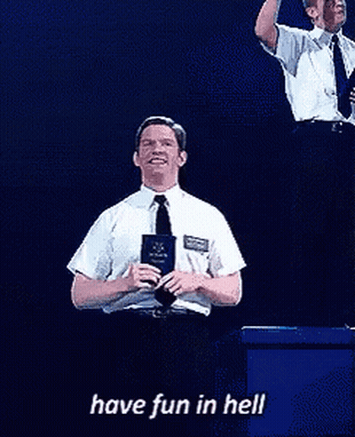 A Man In A White Shirt And Tie Is Holding A Book And Smiling With The Words Have Fun In Hell Below Him GIF