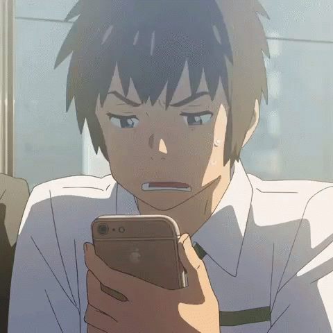 A Man In A White Shirt And Tie Is Looking At A Cell Phone GIF