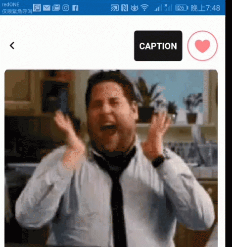 A Man In A White Shirt And Tie Is Making A Funny Face With A Caption Button Below Him GIF