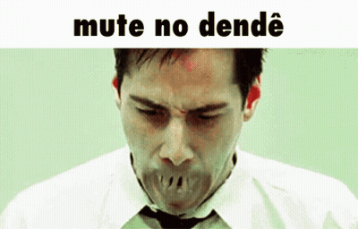 A Man In A White Shirt And Tie Is Making A Funny Face With His Mouth Open . GIF