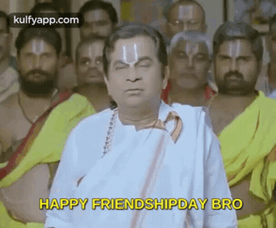 A Man In A White Shirt And Tie Is Standing In Front Of A Group Of Men And Says `` Happy Friendship Day Bro '' . GIF
