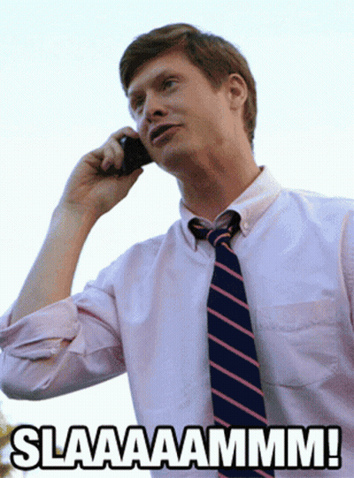 A Man In A White Shirt And Tie Is Talking On A Cell Phone With The Caption Slaaaaammm GIF
