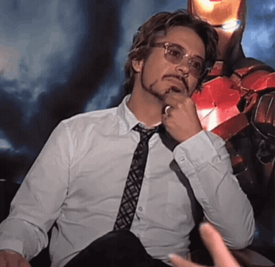 A Man In A White Shirt And Tie Is Thinking GIF