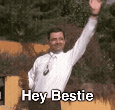 A Man In A White Shirt And Tie Is Waving His Hand And Says Hey Bestie . GIF
