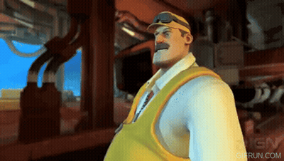 A Man In A White Shirt And Yellow Vest Is Standing In Front Of Ign GIF