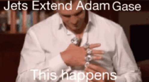A Man In A White Shirt Is Adjusting His Cufflinks With The Words " Jets Extend Adam Gase This Happens " GIF