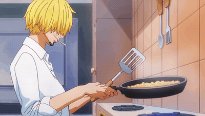 A Man In A White Shirt Is Cooking In A Frying Pan With A Spatula GIF