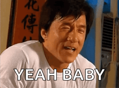 A Man In A White Shirt Is Crying And Says " Yeah Baby " GIF