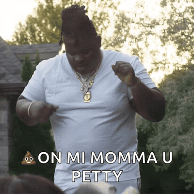 A Man In A White Shirt Is Dancing With The Words On Mi Momma U Petty Below Him GIF