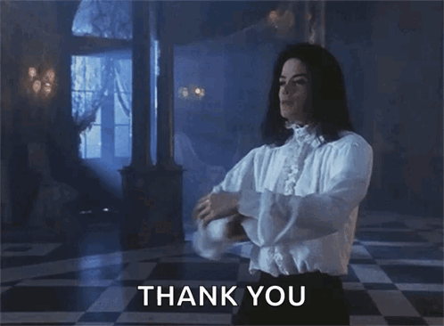 A Man In A White Shirt Is Dancing With The Words Thank You Behind Him GIF