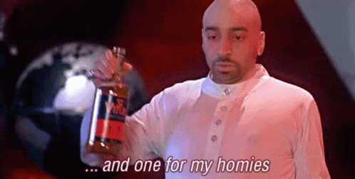 A Man In A White Shirt Is Holding A Bottle Of Wine And Saying `` And One For My Homies '' . GIF