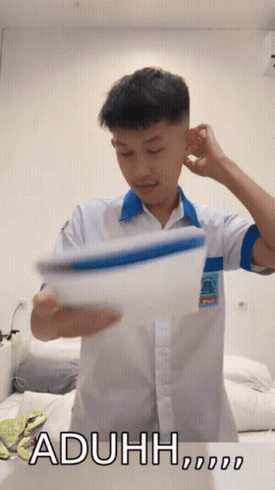 A Man In A White Shirt Is Holding A Piece Of Paper With The Word Aduh Written On The Bottom GIF