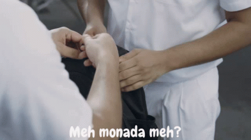 A Man In A White Shirt Is Holding Another Man 'S Hand And The Words " Meh Monada Meh " Are Above Him GIF