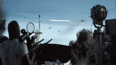 A Man In A White Shirt Is Looking Through A Telescope At A Plane Flying In The Sky GIF