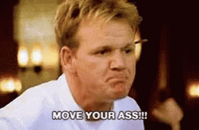 A Man In A White Shirt Is Making A Face And Saying Move Your Ass . GIF