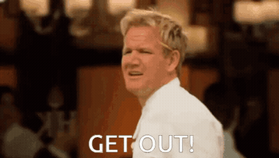 A Man In A White Shirt Is Making A Funny Face And Saying Get Out . GIF