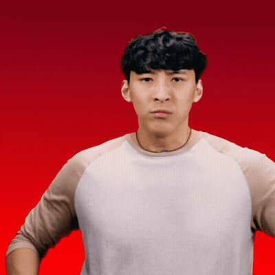A Man In A White Shirt Is Making A Funny Face With His Hands On His Hips GIF