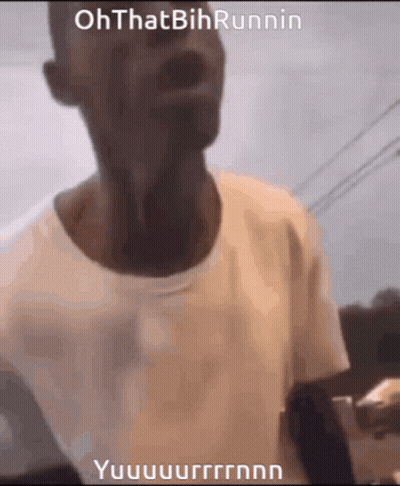 A Man In A White Shirt Is Making A Funny Face With The Words Oh That Bih Runnin Written On It GIF