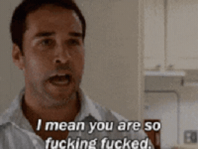 A Man In A White Shirt Is Saying " I Mean You Are So Fucking Fucked " GIF