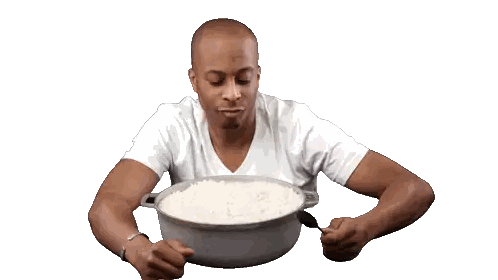 A Man In A White Shirt Is Scooping Rice Out Of A Pot With A Spoon Sticker