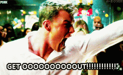 A Man In A White Shirt Is Screaming With The Words Get Ooooooo Out Written On The Bottom GIF