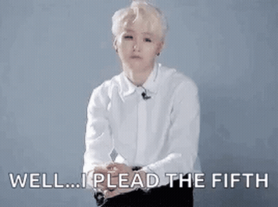 A Man In A White Shirt Is Sitting Down With His Hands Outstretched And Says `` Well ... I Plead The Fifth '' . GIF