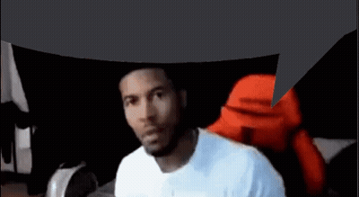 A Man In A White Shirt Is Sitting In A Chair With A Speech Bubble Above His Head . GIF