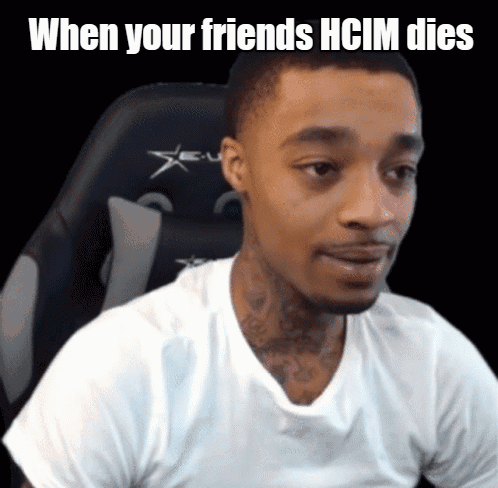 A Man In A White Shirt Is Sitting In A Chair With The Words " When Your Friends Hcim Dies " Below Him GIF