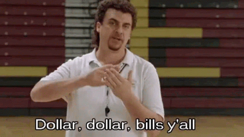A Man In A White Shirt Is Standing In Front Of A Basketball Court And Making A Gesture . GIF