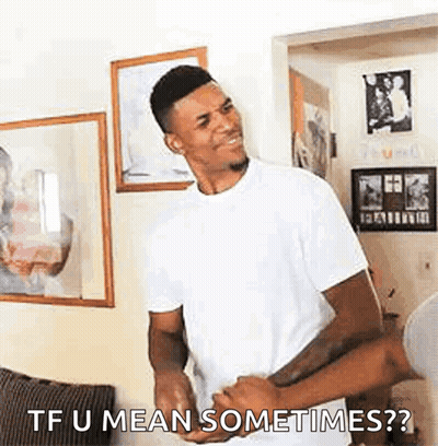 A Man In A White Shirt Is Standing Next To Another Man In A Living Room . GIF