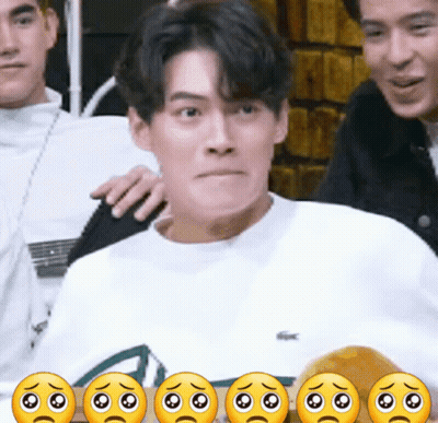 A Man In A White Shirt Is Surrounded By Smiley Faces GIF