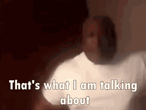 A Man In A White Shirt Is Talking About Something GIF