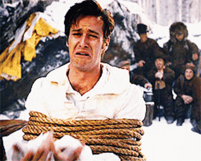 A Man In A White Shirt Is Tied Up With Rope And Crying GIF
