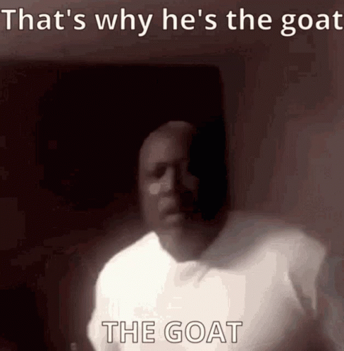 A Man In A White Shirt Says That 'S Why He 'S The Goat And The Goat Is Behind Him GIF