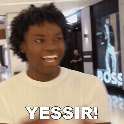 A Man In A White Shirt Says Yessir In Front Of A Boss Sign GIF