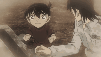 A Man In A White Shirt Stands Next To A Little Boy GIF