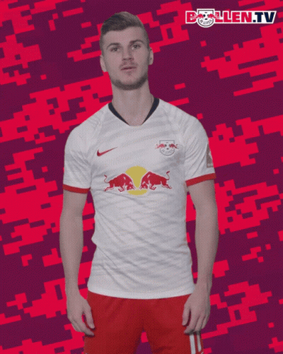 A Man In A White Shirt With Red Bulls On It GIF