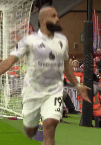 A Man In A White Shirt With The Number 19 On It GIF