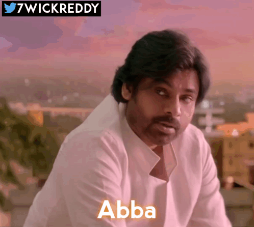 A Man In A White Shirt With The Word Abba On The Front GIF