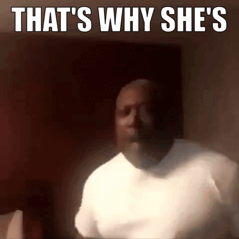A Man In A White Shirt With The Words That 'S Why She 'S Written Above Him GIF