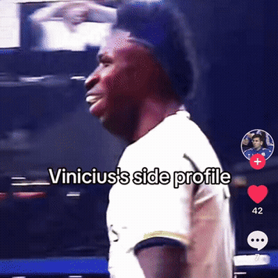 A Man In A White Shirt With The Words " Vinicius 'S Side Profile " Above Him GIF