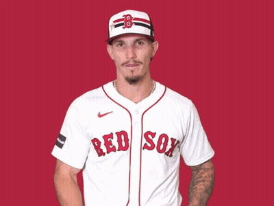 A Man In A White Sox Jersey Points Up GIF