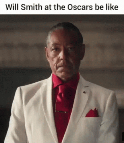 A Man In A White Suit And Red Tie With The Caption Will Smith At The Oscars Be Like . GIF