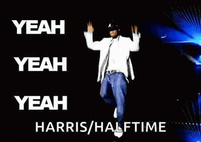 A Man In A White Suit Is Dancing With The Words " Yeah Yeah Yeah Harris / Halftime " Above Him GIF