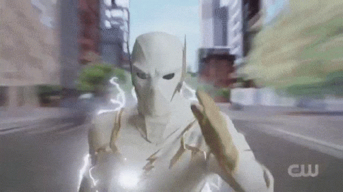 A Man In A White Suit Is Holding A Lightning Bolt In His Hand .. GIF