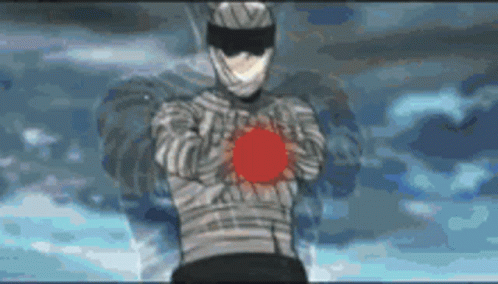 A Man In A White Suit Is Holding A Red Ball In His Hands . GIF