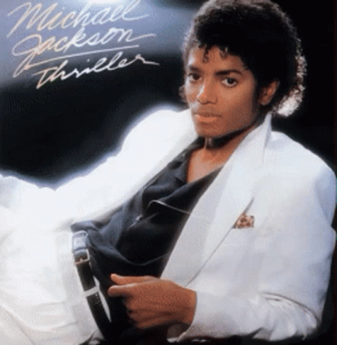 A Man In A White Suit Is On The Cover Of Michael Jackson 'S Thriller Album GIF