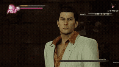 A Man In A White Suit Is Playing A Video Game With A Lion King In The Background GIF