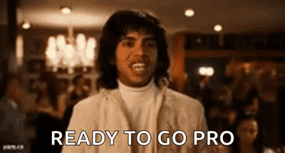 A Man In A White Suit Is Ready To Go Pro In A Restaurant . GIF