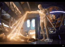 A Man In A White Suit Is Standing In A Room With Lightning Coming Out Of His Hand GIF